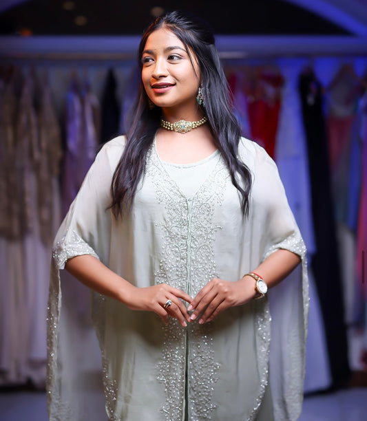 Elegant designer cape dress with palazzo pants in mint green