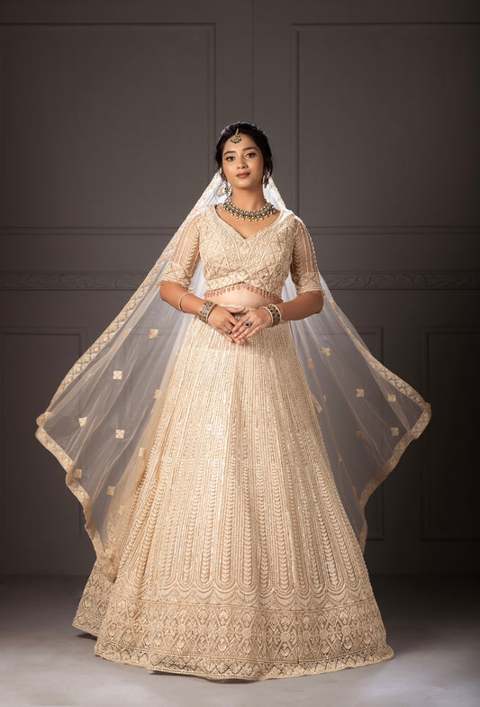 Pearl white lehenga with beaded sequined bridal lehenga