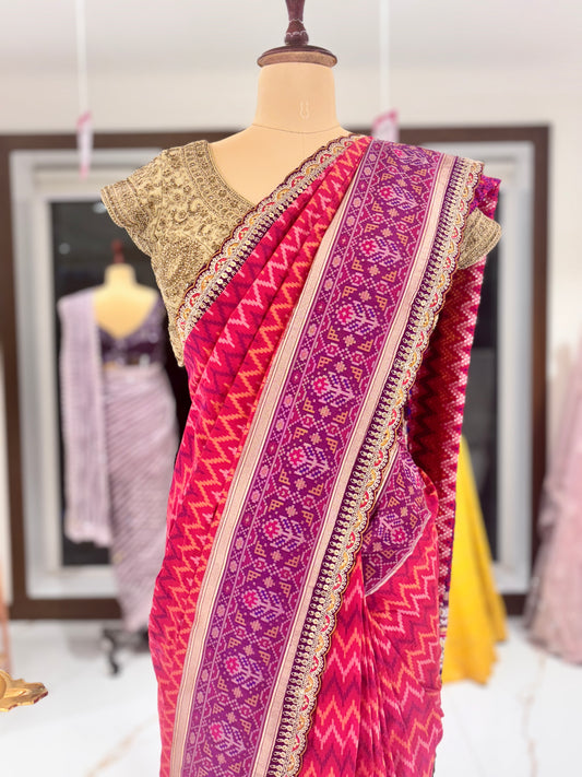 Pink Pattola Silk Saree with embroidery.
