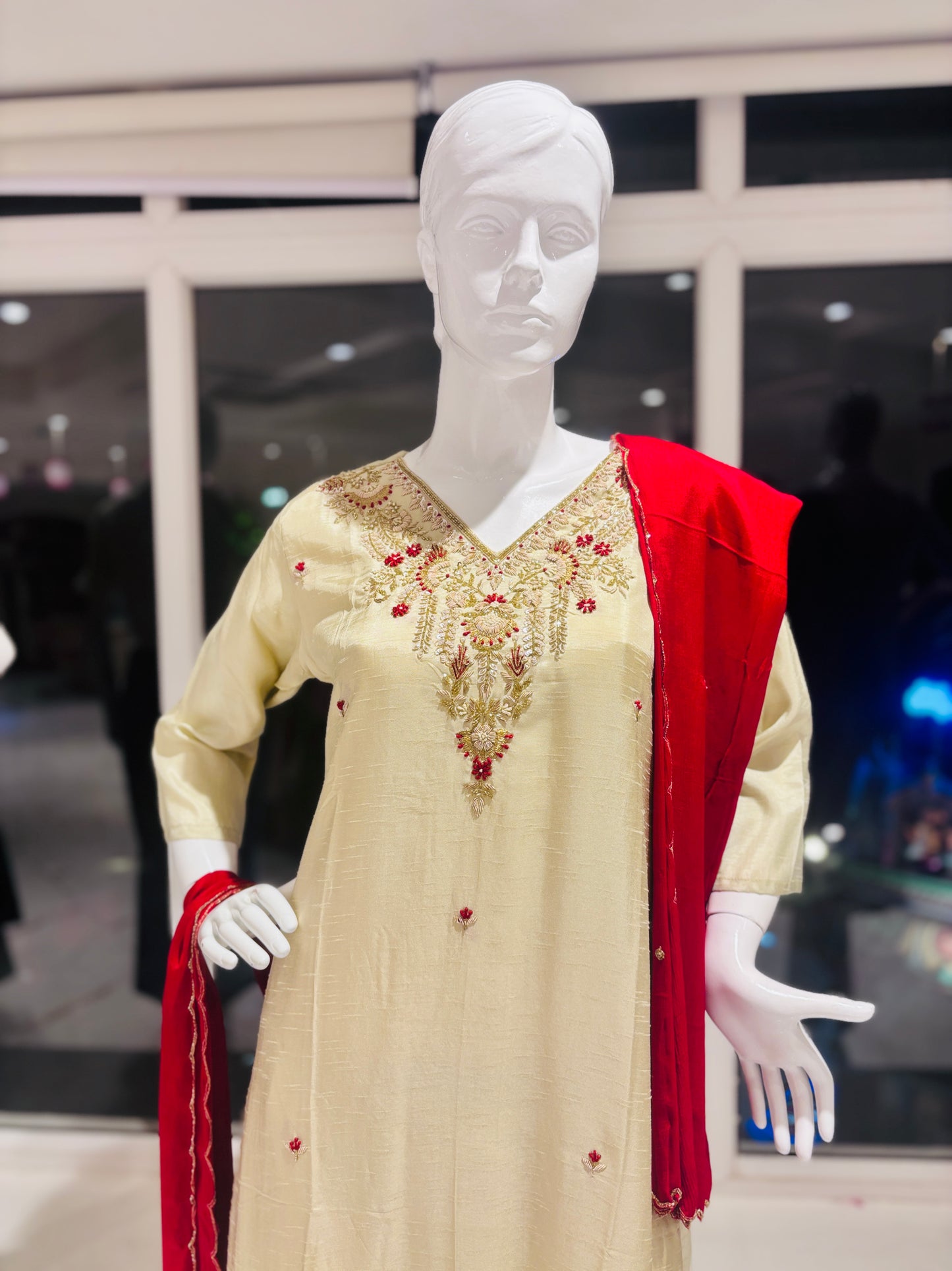 Embroidered Salwar suit in cream, color and red Dupata