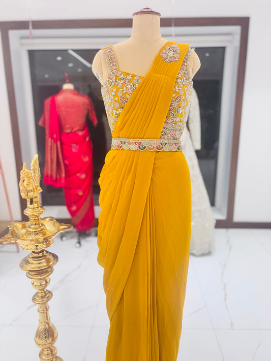 Yellow ready-made sari with embroidered blouse and belt