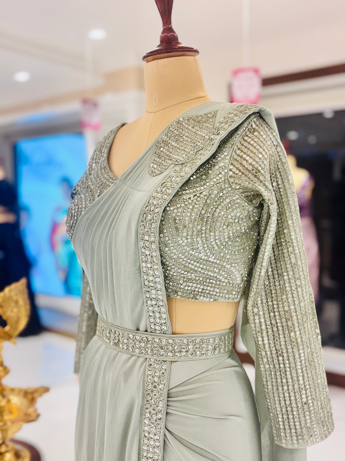 Mint green ready made Saree with embellished blouse
