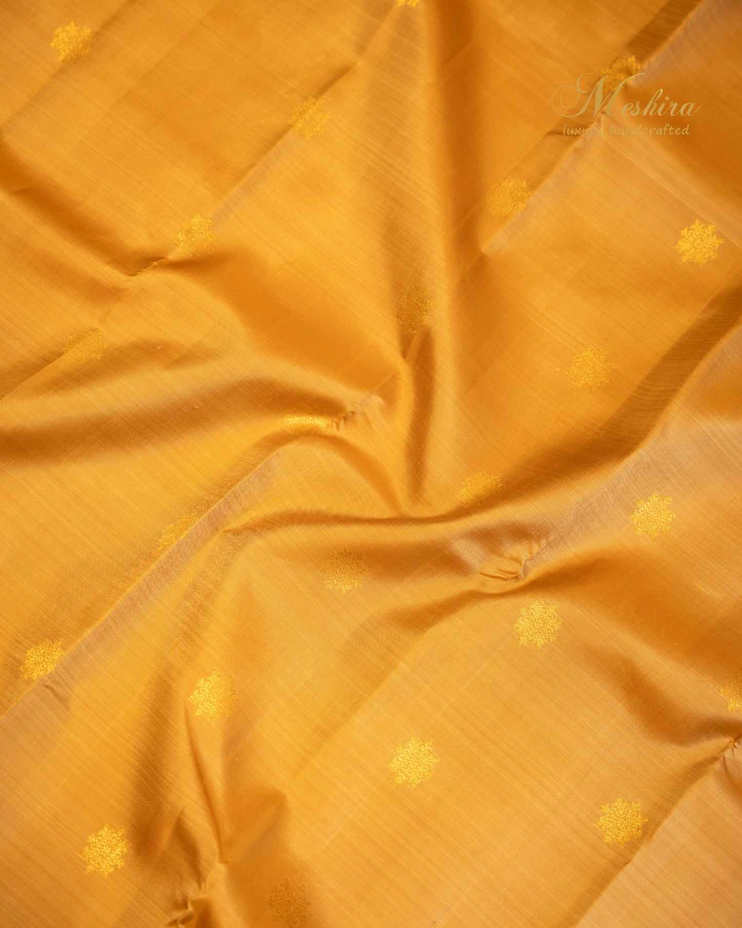 Mustard Beige Kanchivaram silk saree with Maroon Zari border.