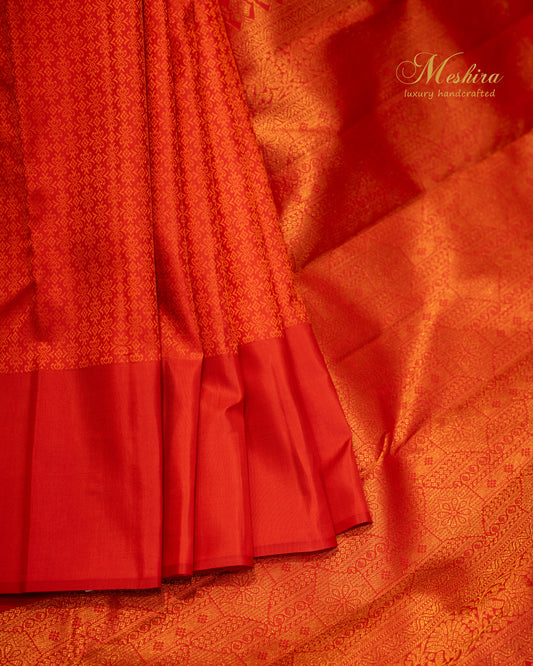 Vermilion flame Red Kanchivaram silk saree in self color border.