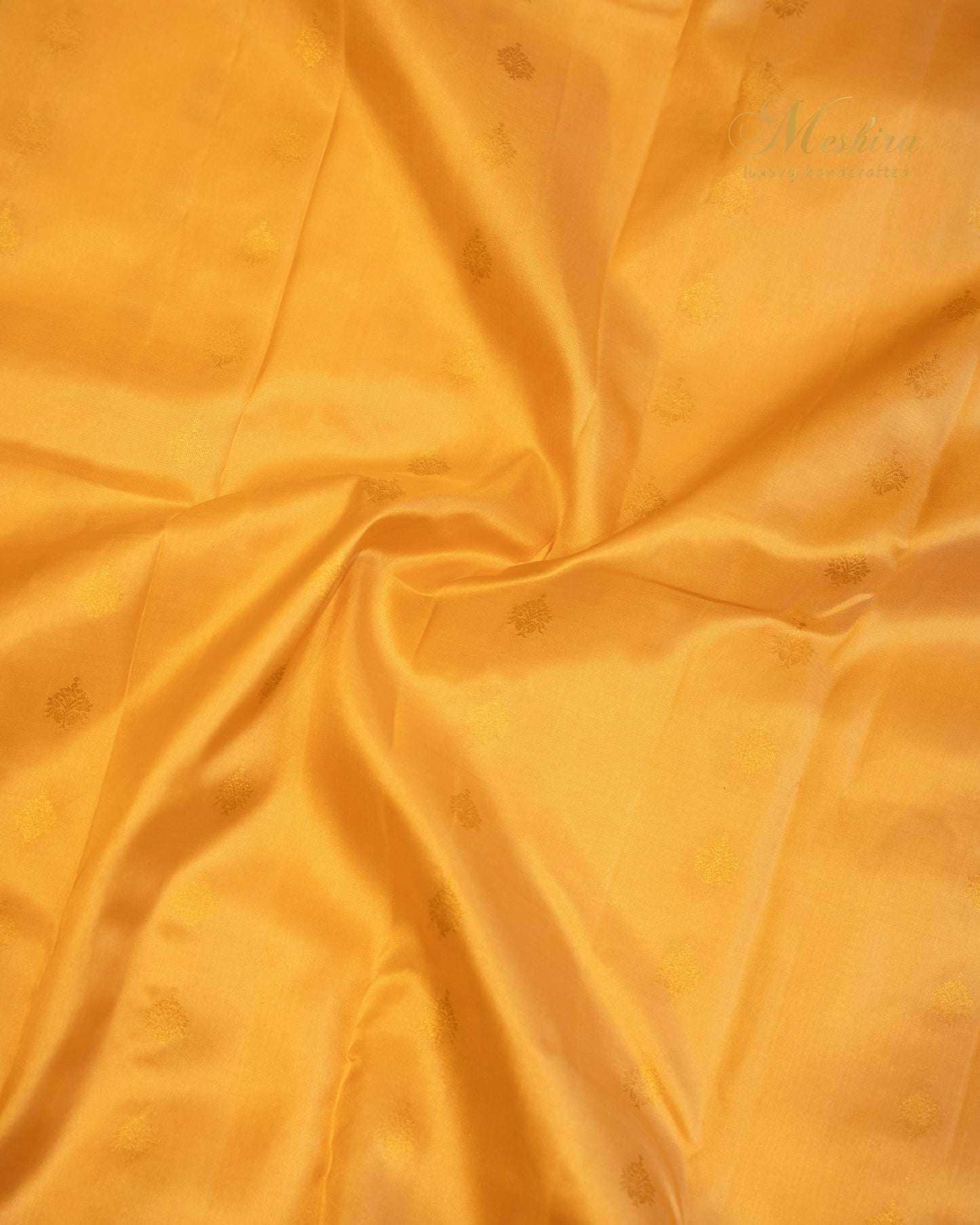 Elegant Kanchivaram silk saree in golden yellow body and rich black border.