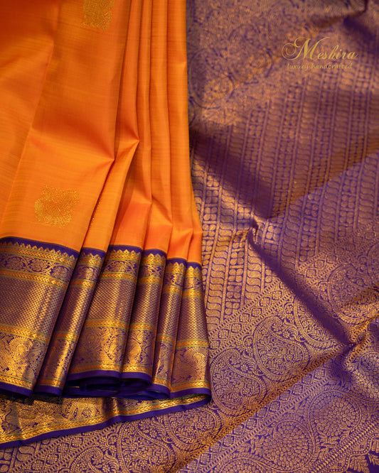 Vibrant Mango Yellow Kanchipuram Silk Saree with Royal Blue and Gold Zari