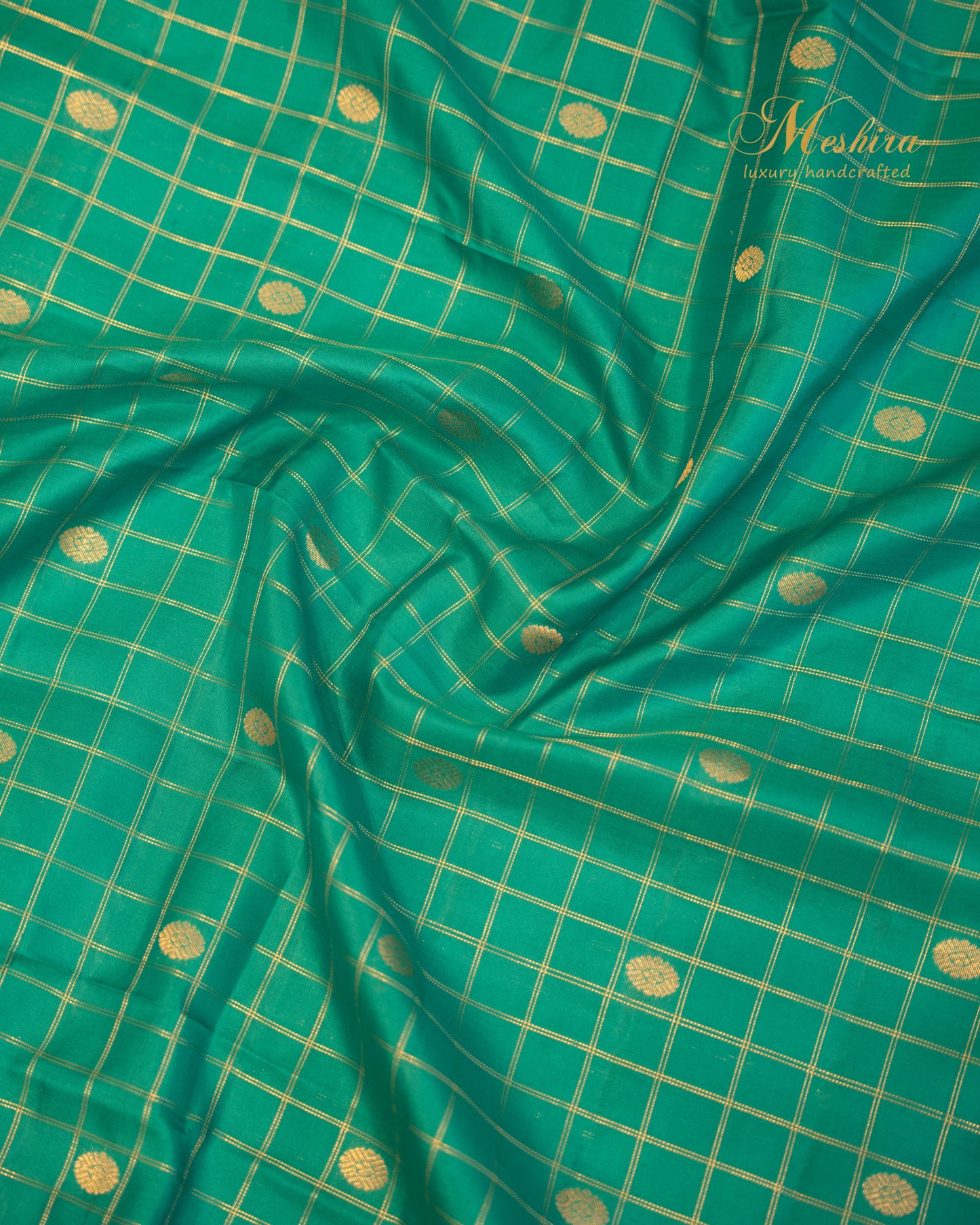 Regal Teal Kanchivaram Silk Saree with a Zari-Embellished mid night blue Border