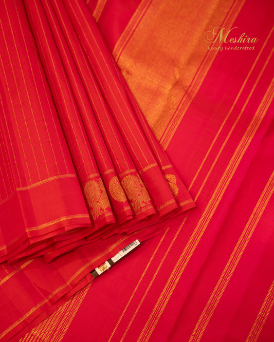Vermilion Elegance in Kanchivaram Silk with Gold and Zari Accents