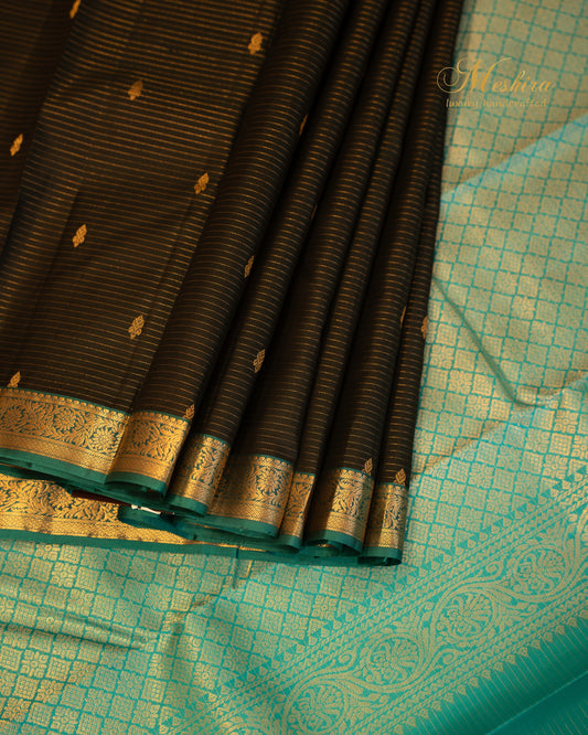 Noir Elegance in Kanchivaram silk saree with Turquoise Zari Brilliance