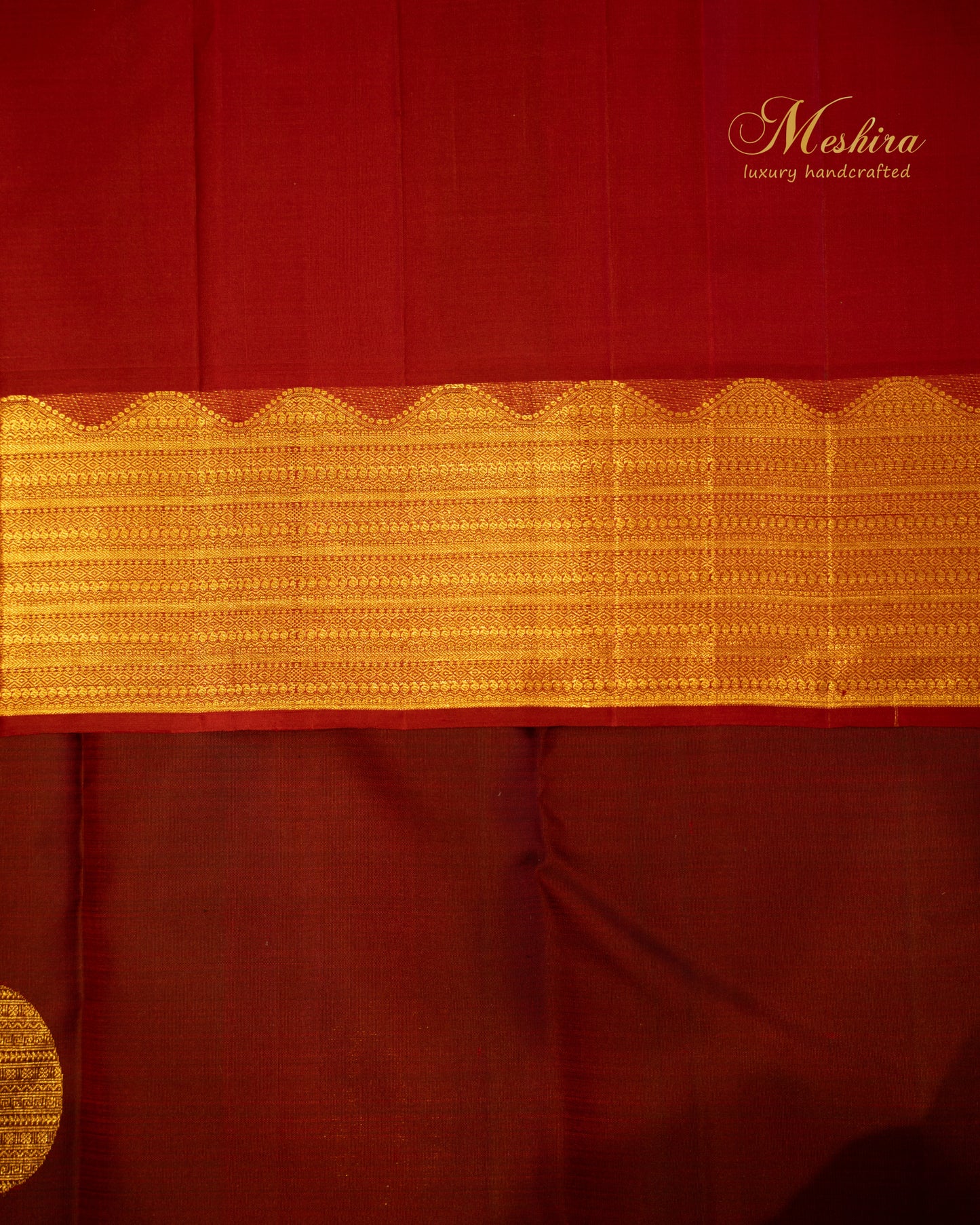 Crimson Kanchivaram silk saree with temple zari and gold pallu