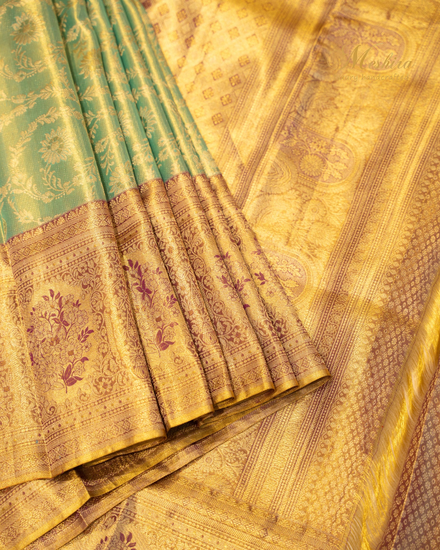 Heritage Green Kanchivaram Silk Saree Adorned with Antique Gold Zari
