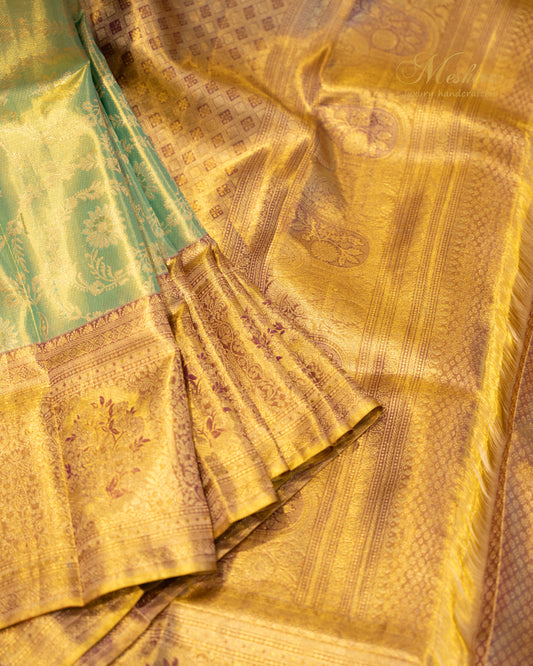 Heritage Green Kanchivaram Silk Saree Adorned with Antique Gold Zari