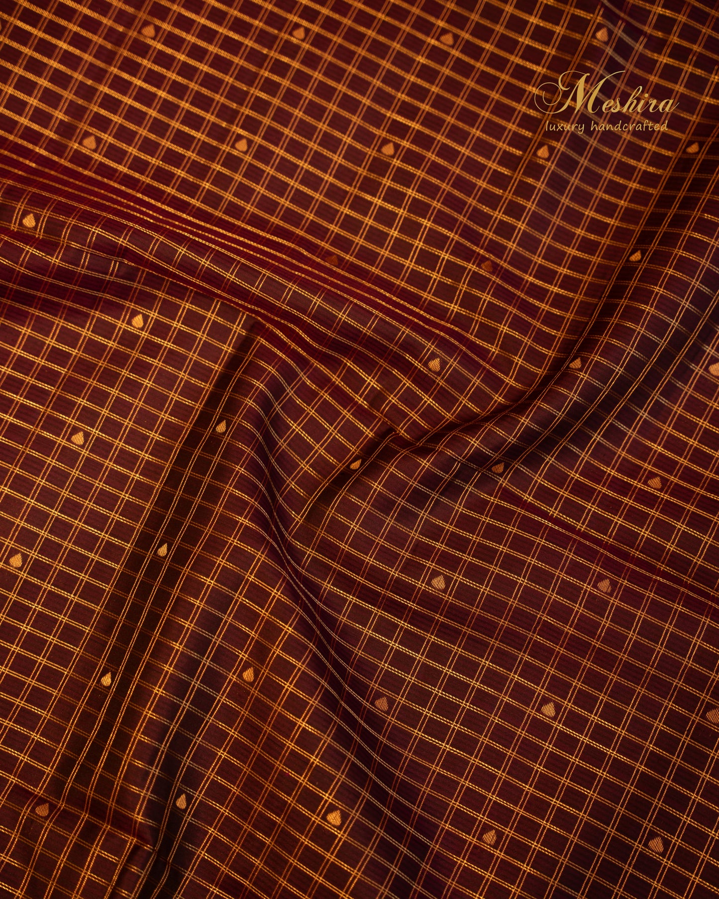 Majestic Maroon Kanchivaram silk saree with Peach-Gold Elegance