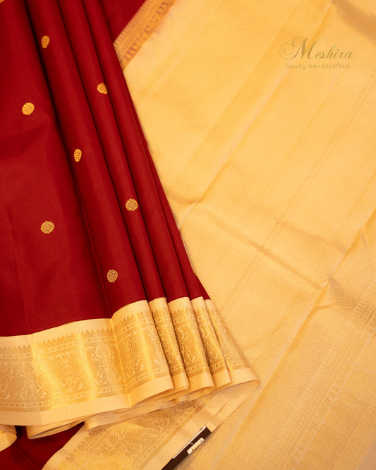 Opulent Maroon Kanchivaram Silk saree with Gold Zari