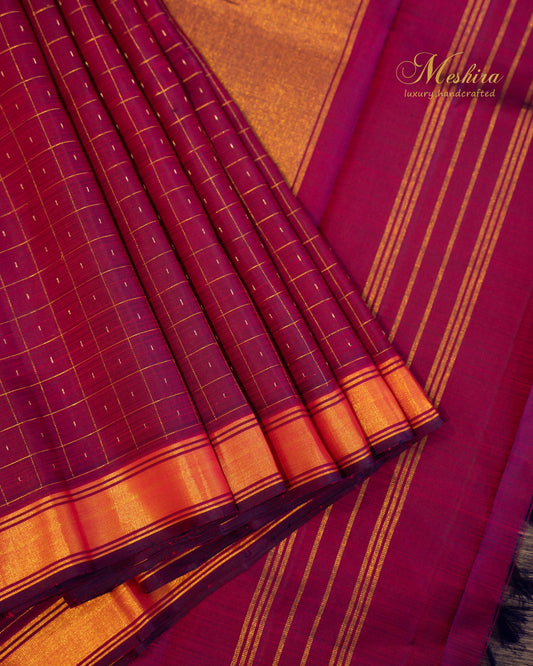 Elegant Purple Kanchivaram silk saree Draped in Burnt Orange Zari
