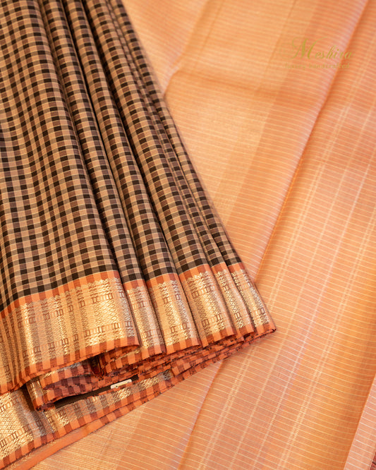 Classic Checked Kanchivaram silk Draped in Peach Zari Elegance