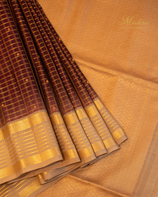 Majestic Maroon Kanchivaram silk saree with Peach-Gold Elegance