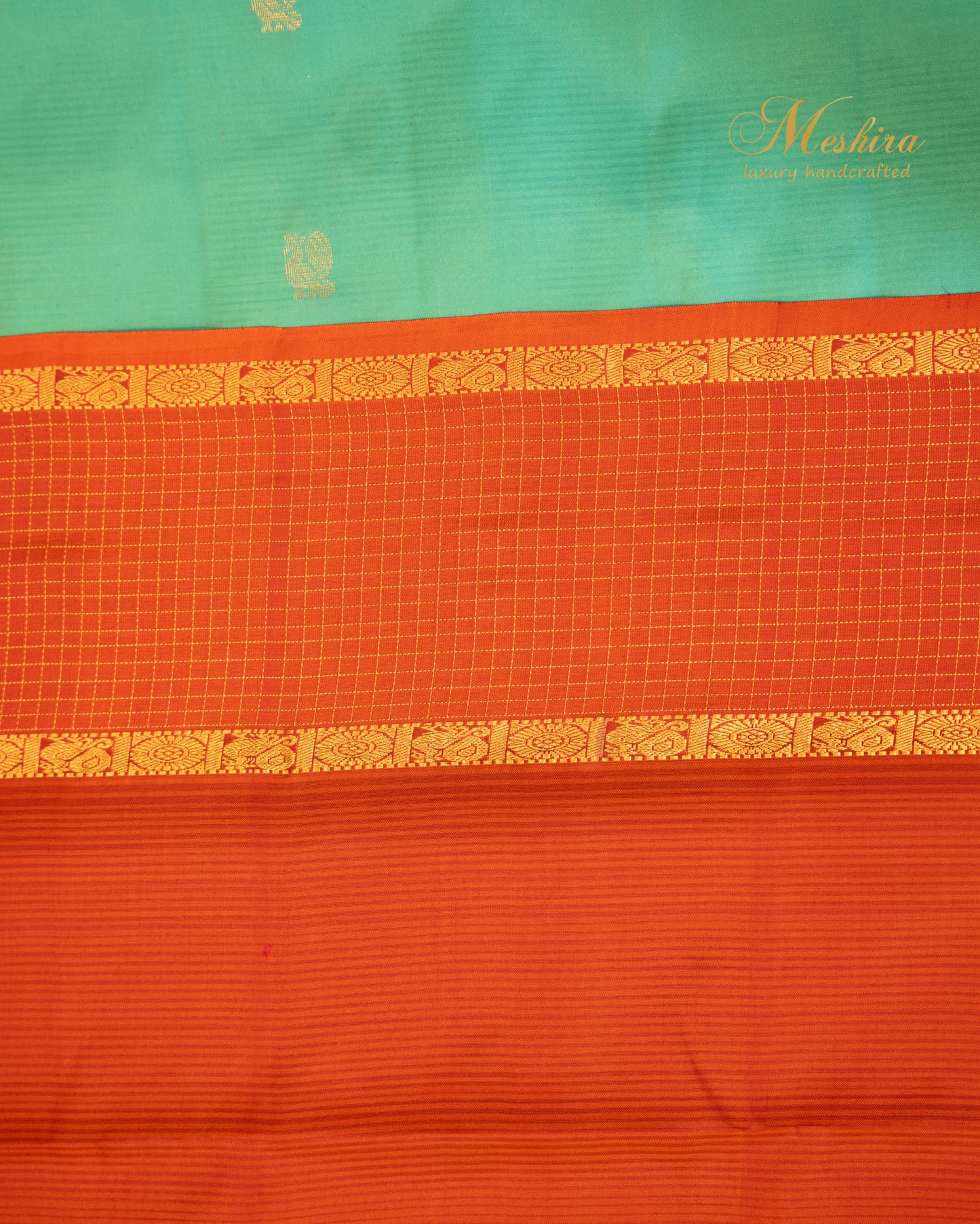 Radiant Varnam Aqua Green Kanchivaram Silk saree with Fiery orange Zari