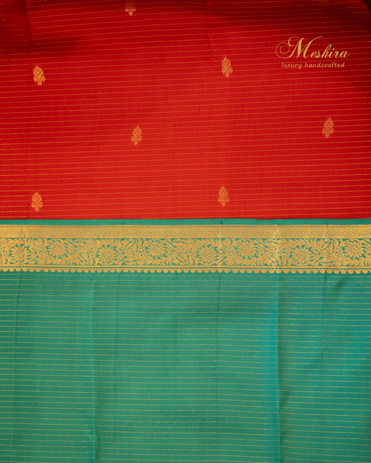 Radiant red Kanchivaram silk saree with turquoise pallu and zari work