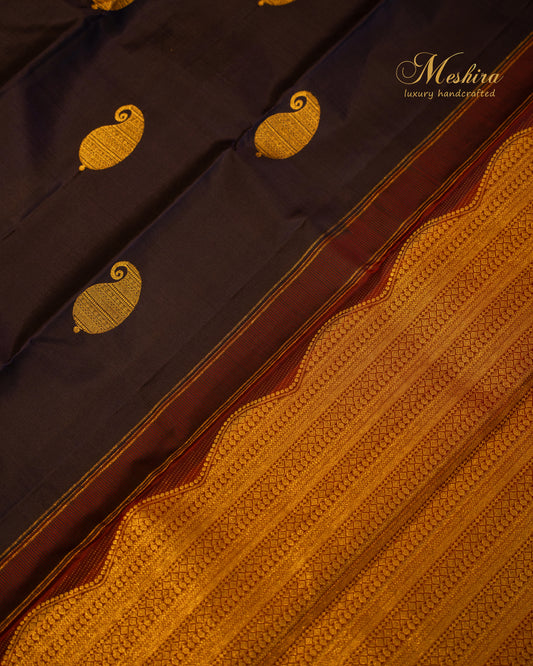 Royal blue Kanchivaram silk saree with gold zari and maroon edge