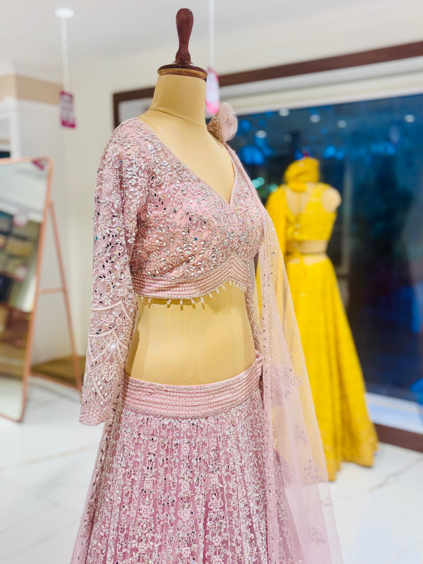 Blush pink embellished net Bridal Lehenga