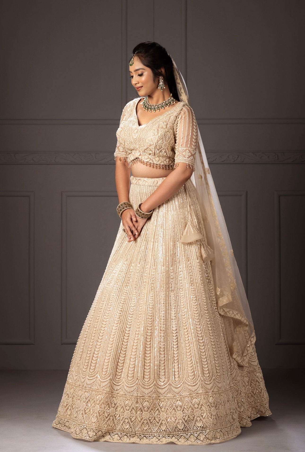 Pearl white lehenga with beaded sequined bridal lehenga