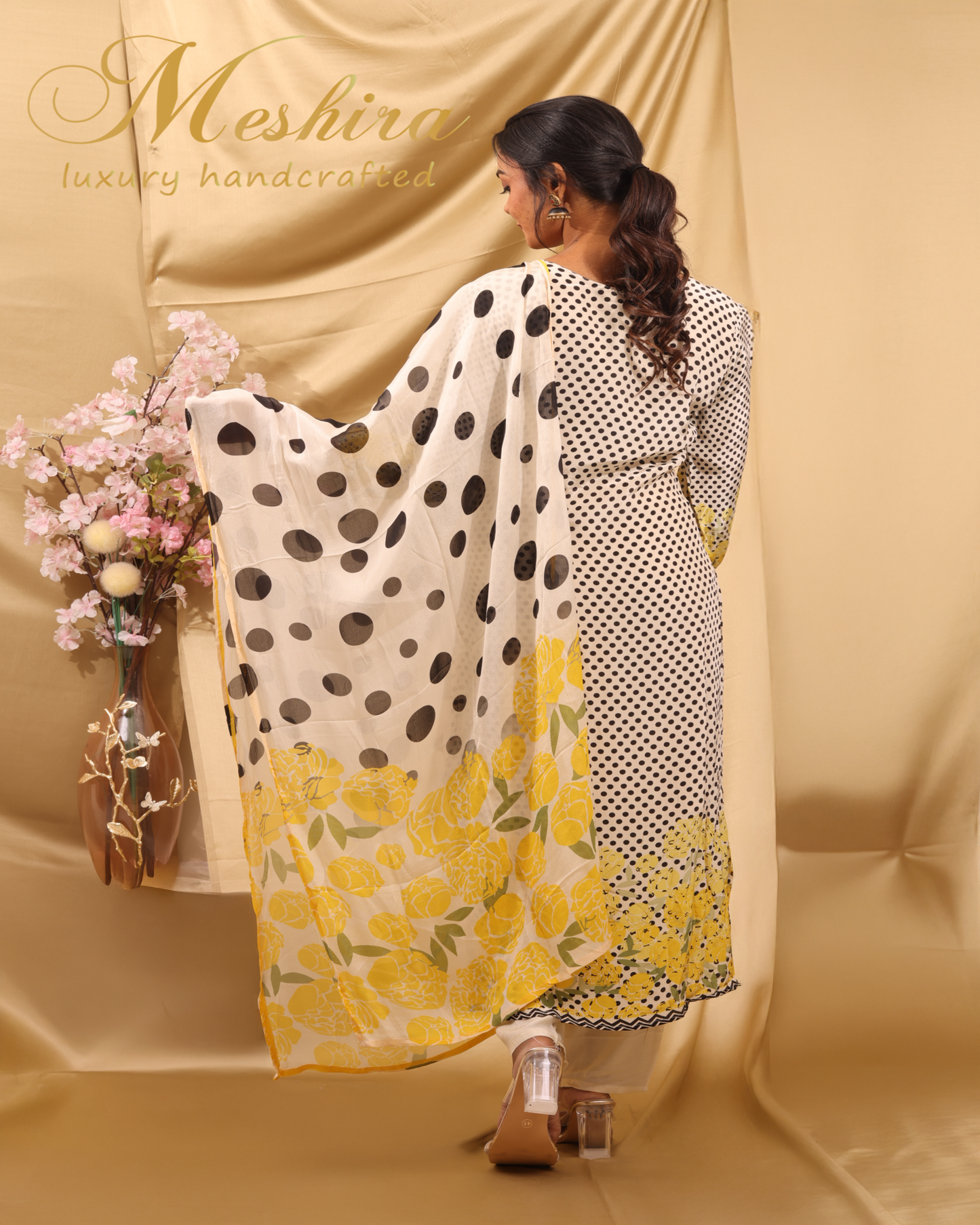 Dotted Elegance with Floral Pop