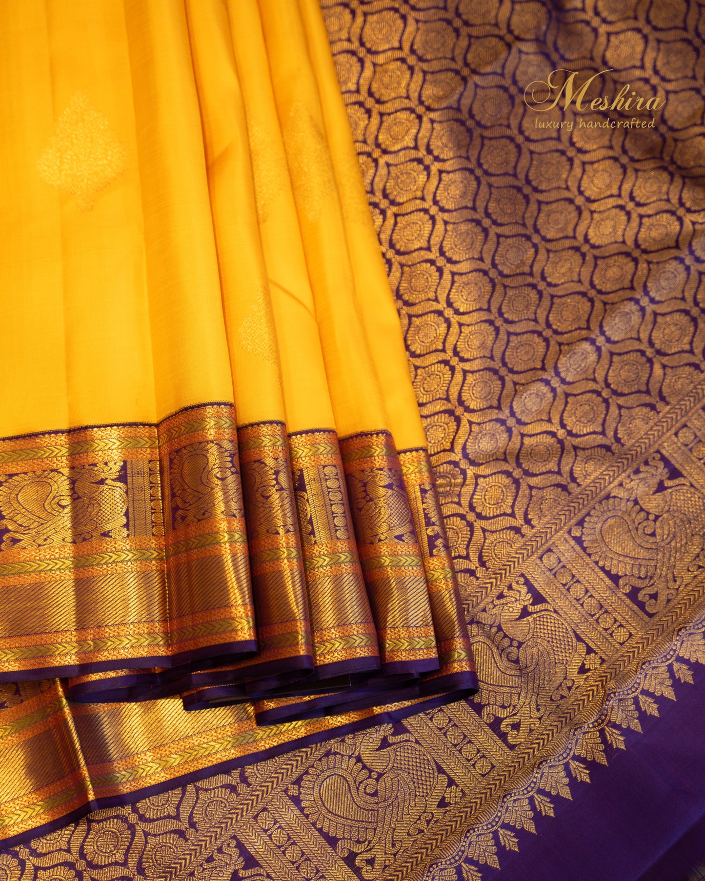 Sunshine yellow with royal purpose Kanchivaram silk saree.