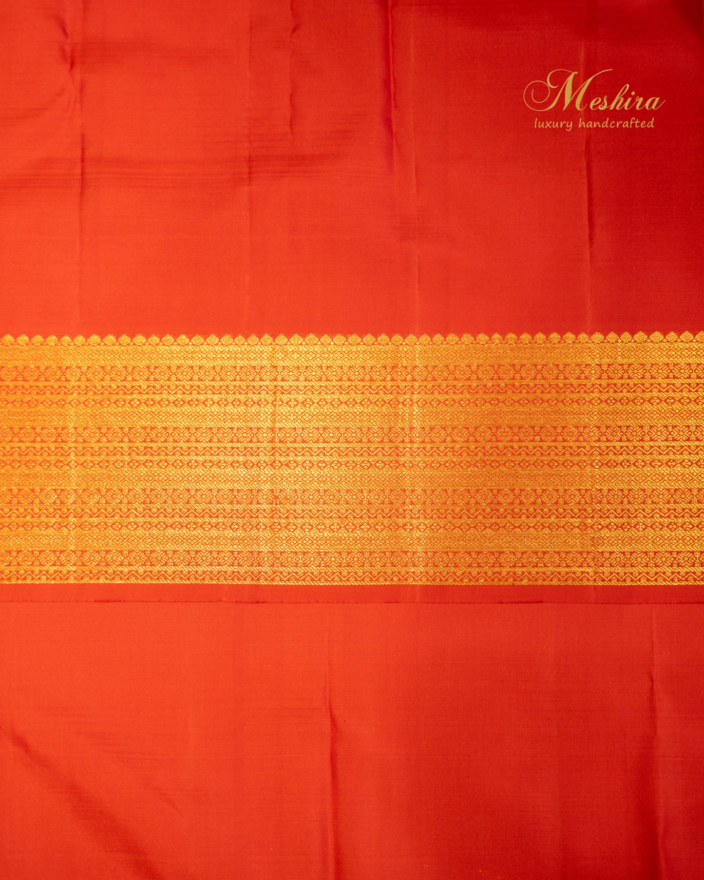 Vermillion red with gold butta Kanchivaram silk saree