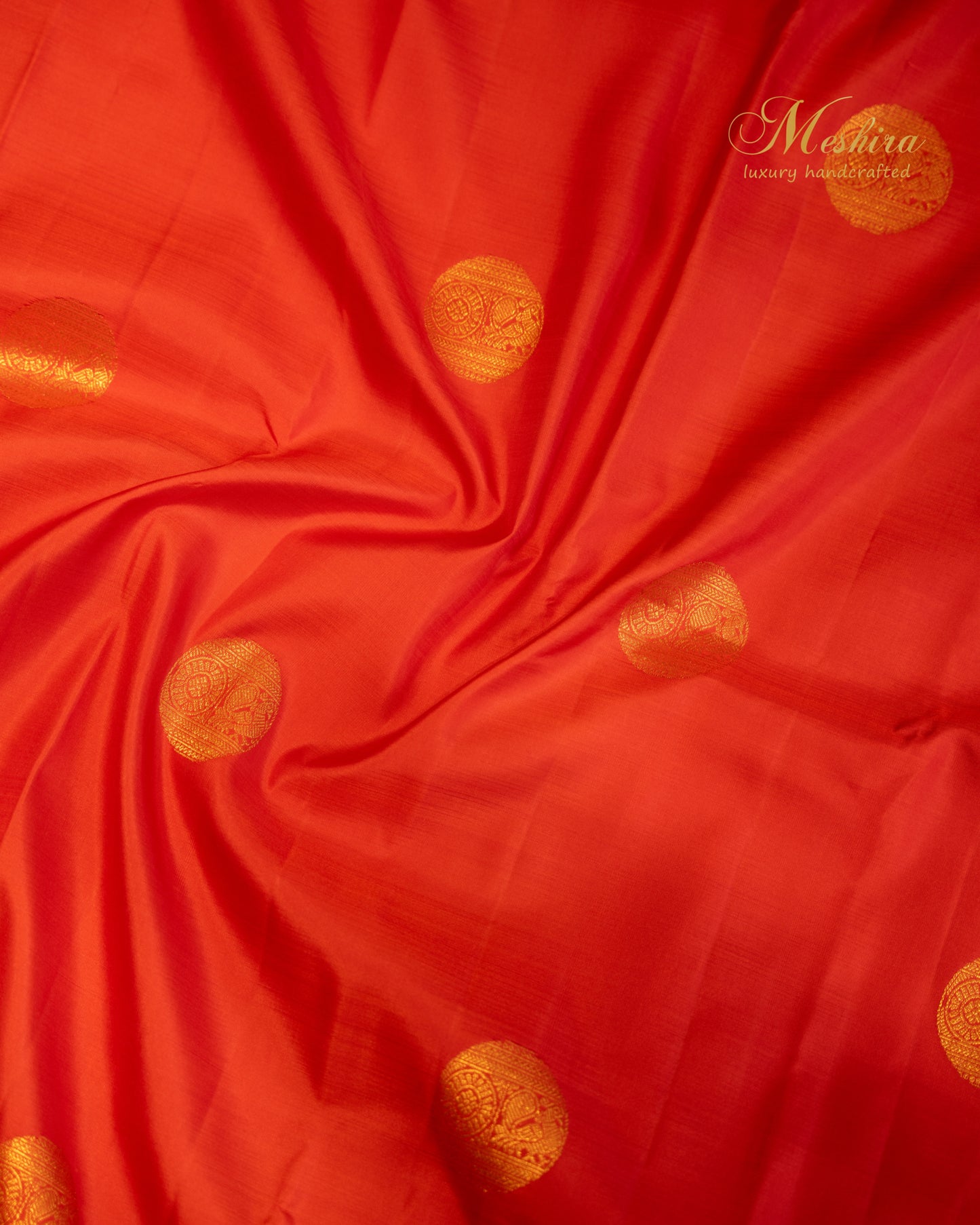Vermillion red with gold butta Kanchivaram silk saree