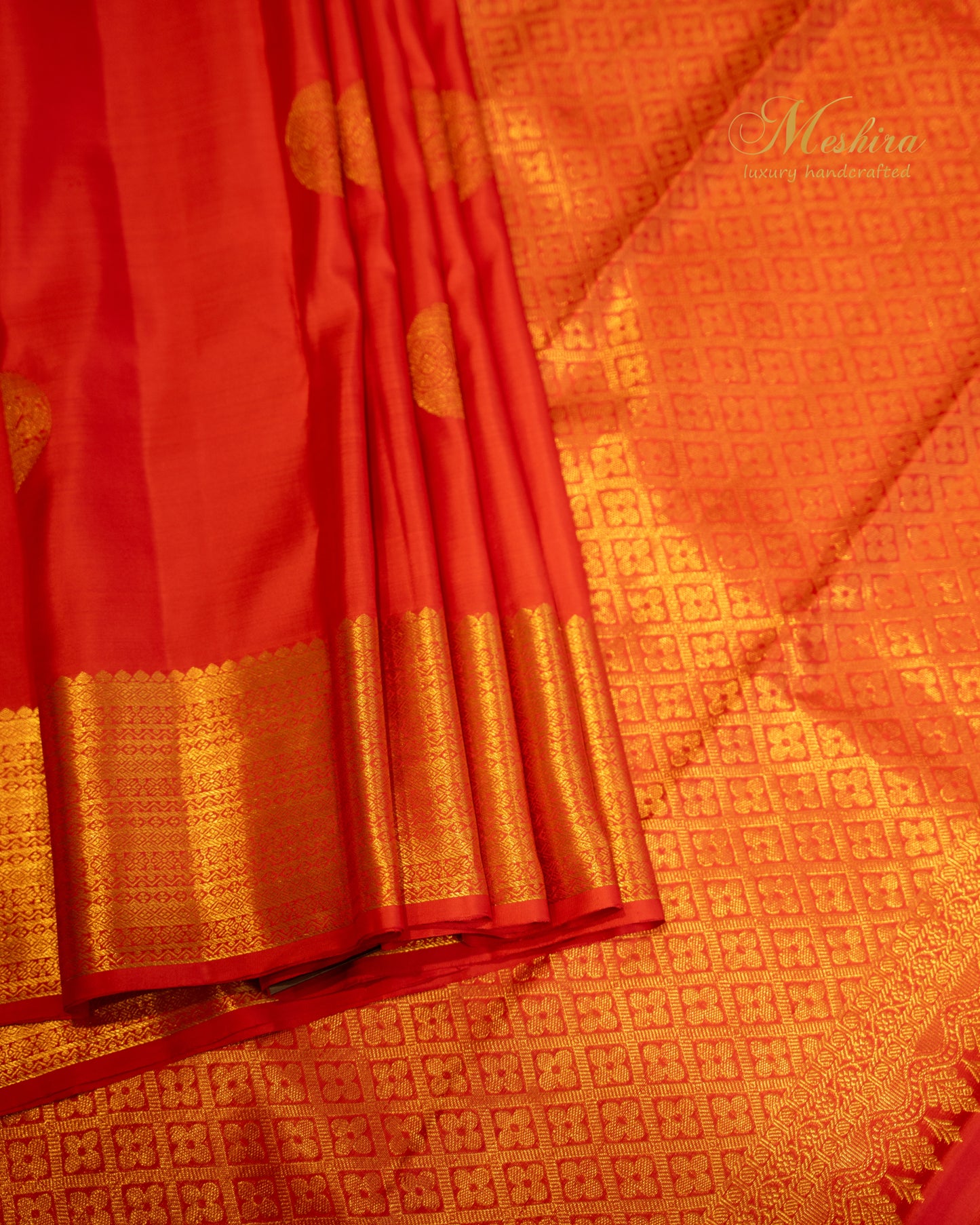 Vermillion red with gold butta Kanchivaram silk saree