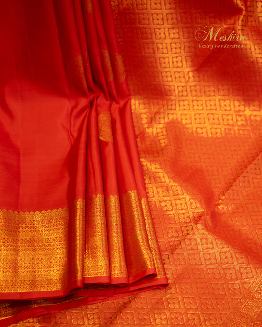 Vermillion red with gold butta Kanchivaram silk saree