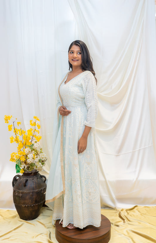 A serene ivory Anarkali adorned with delicate embroidery