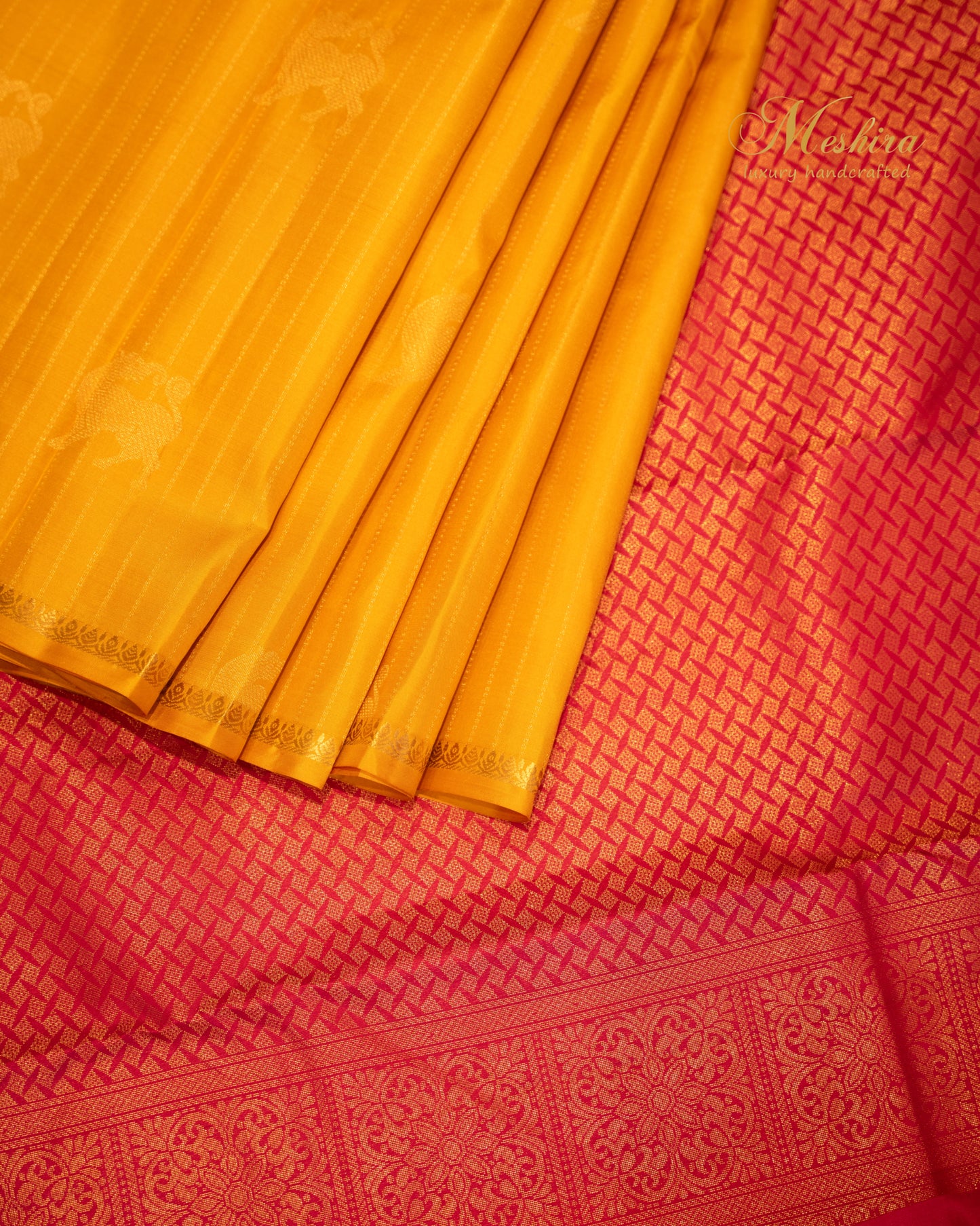 Borderless Kanchivaram Silk Saree in yellow and red with golden zari.