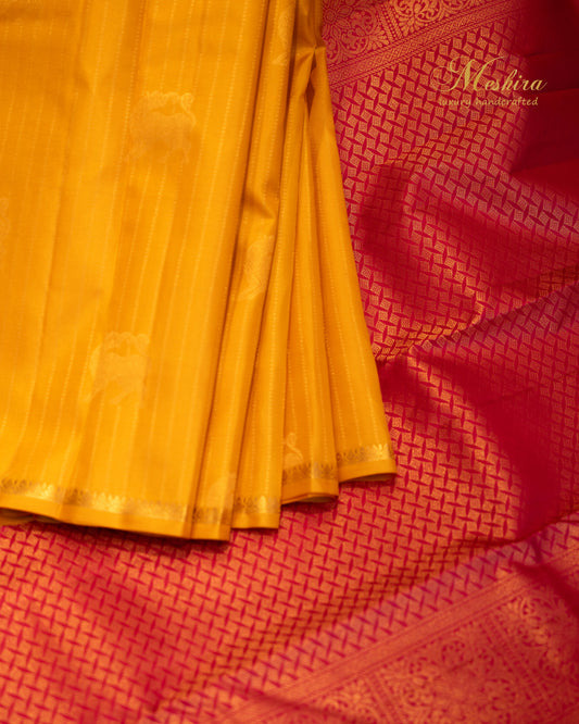 Borderless Kanchivaram Silk Saree in yellow and red with golden zari.