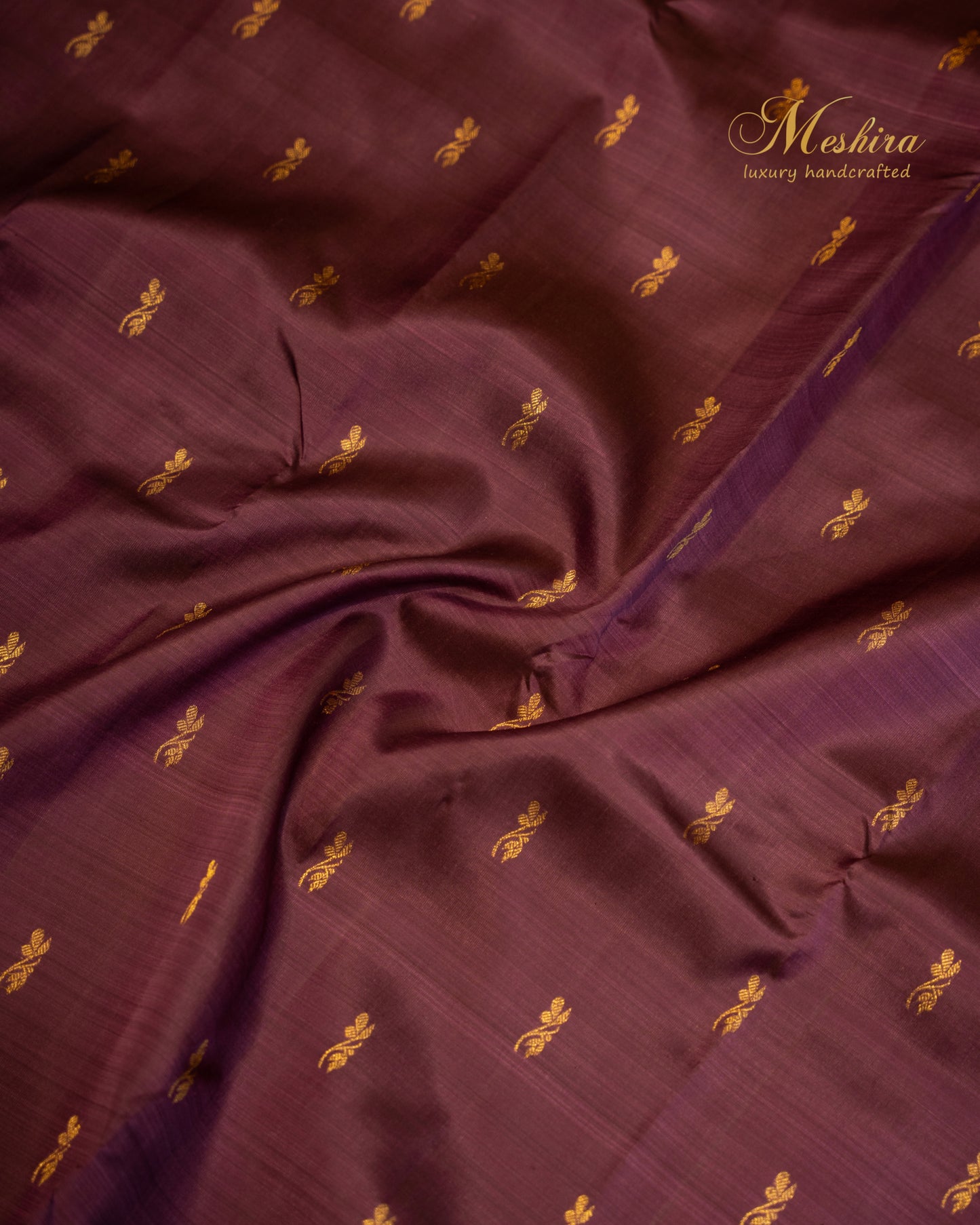 Royal Plum Kanchivaram silk saree in gold border and buttas