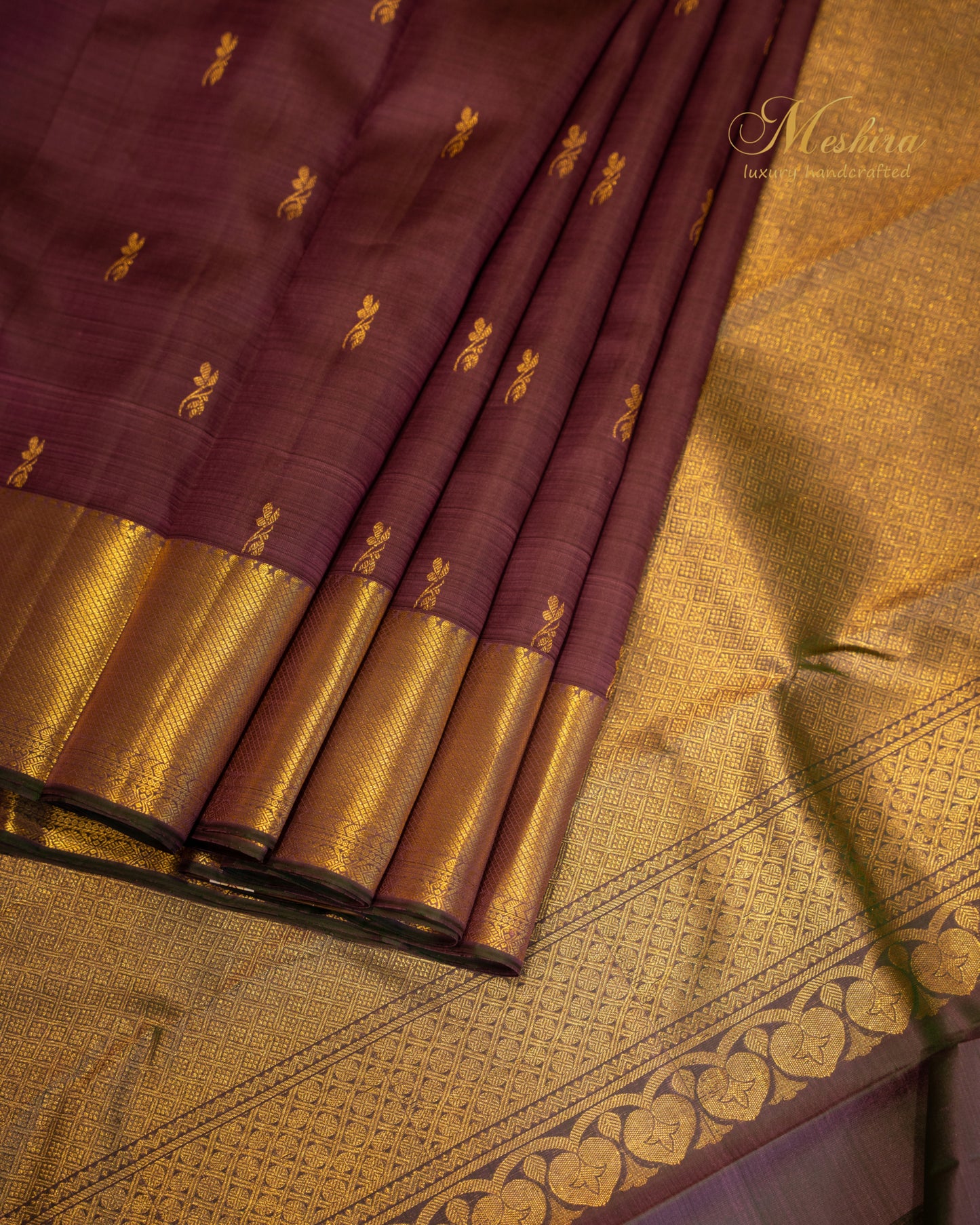 Royal Plum Kanchivaram silk saree in gold border and buttas