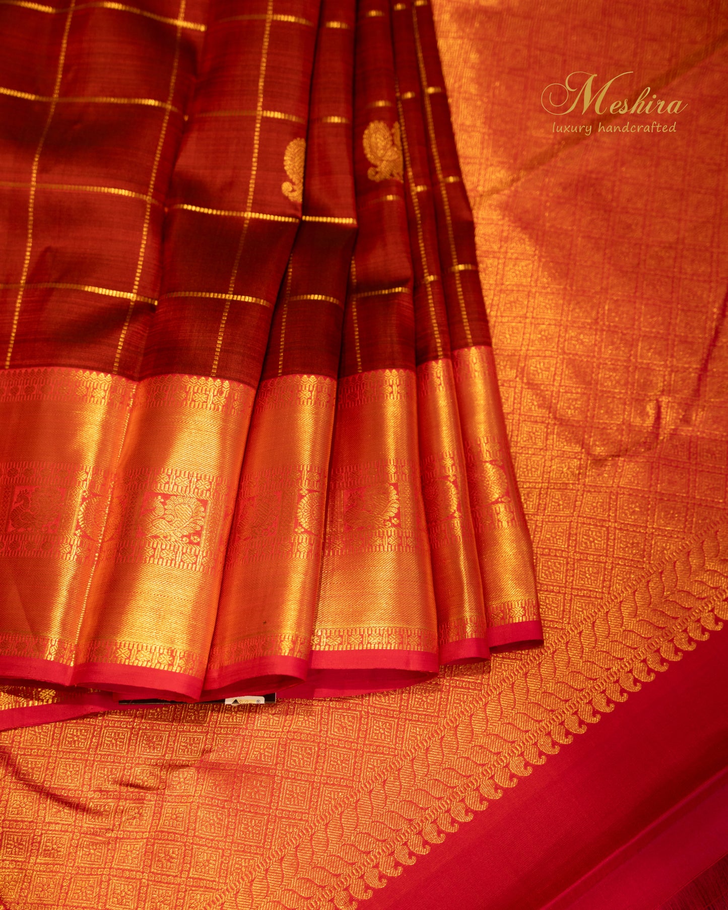 Maroon Kanchivaram Silk Saree with golden Zari in Bhavaji Border