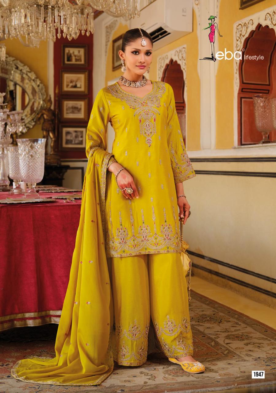 Traditional embroidered salwar kameez with dupatta in mustard colour.