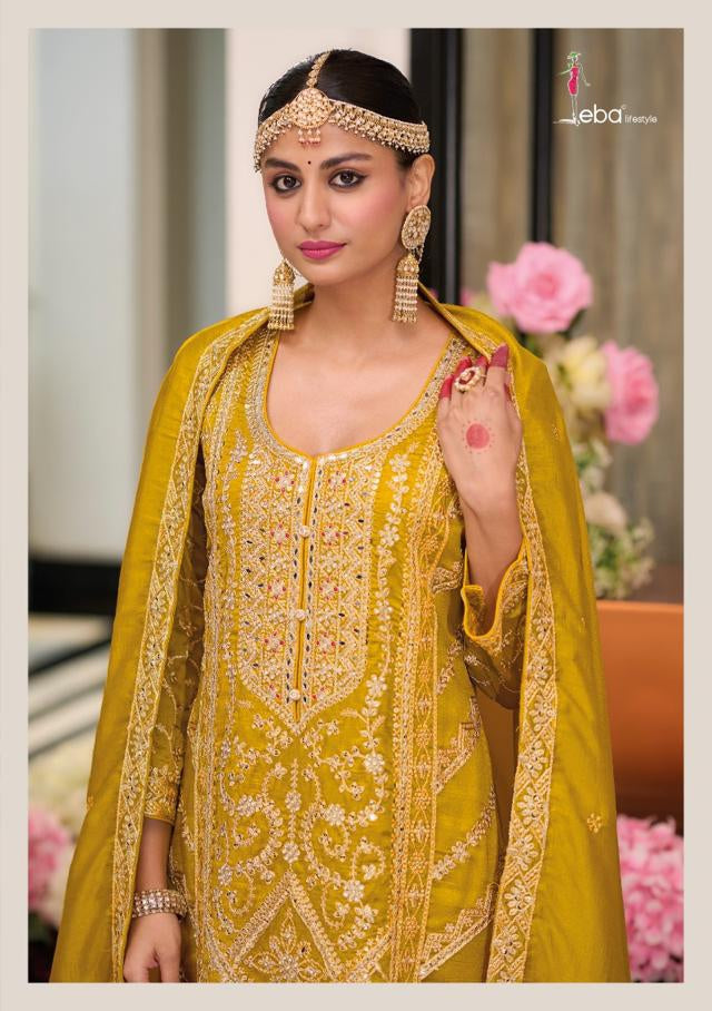 Bright mustard yellow Salwar Suit with embroidery work.