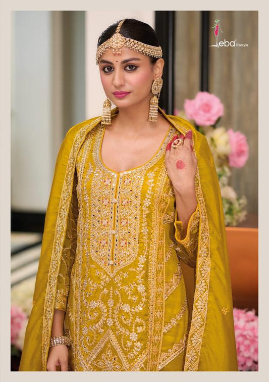 Bright mustard yellow Salwar Suit with embroidery work.
