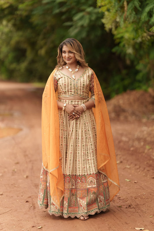 Beautiful Beige lehanga with embroidery design all over the dress