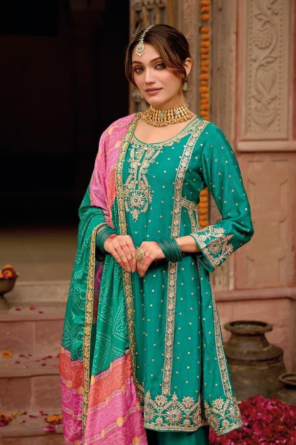 Teal traditional Salwar kameez with beautiful work.