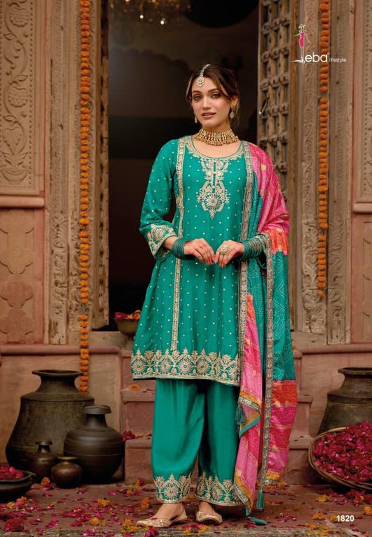 Teal traditional Salwar kameez with beautiful work.