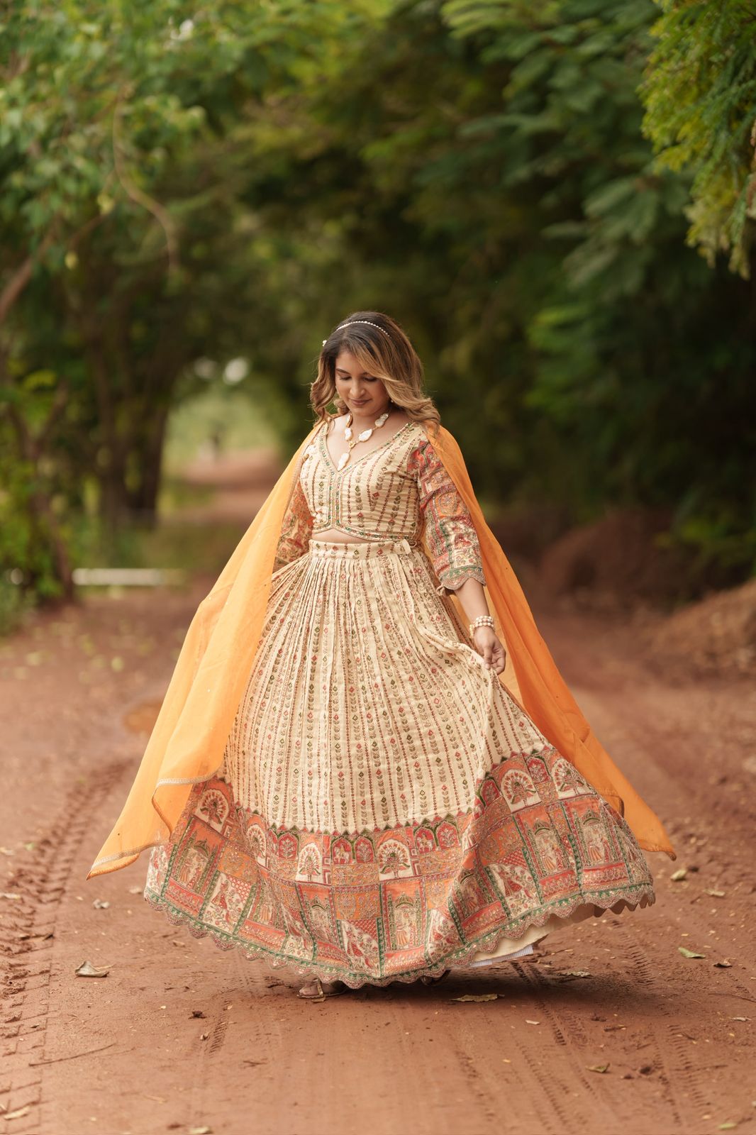 Beautiful Beige lehanga with embroidery design all over the dress