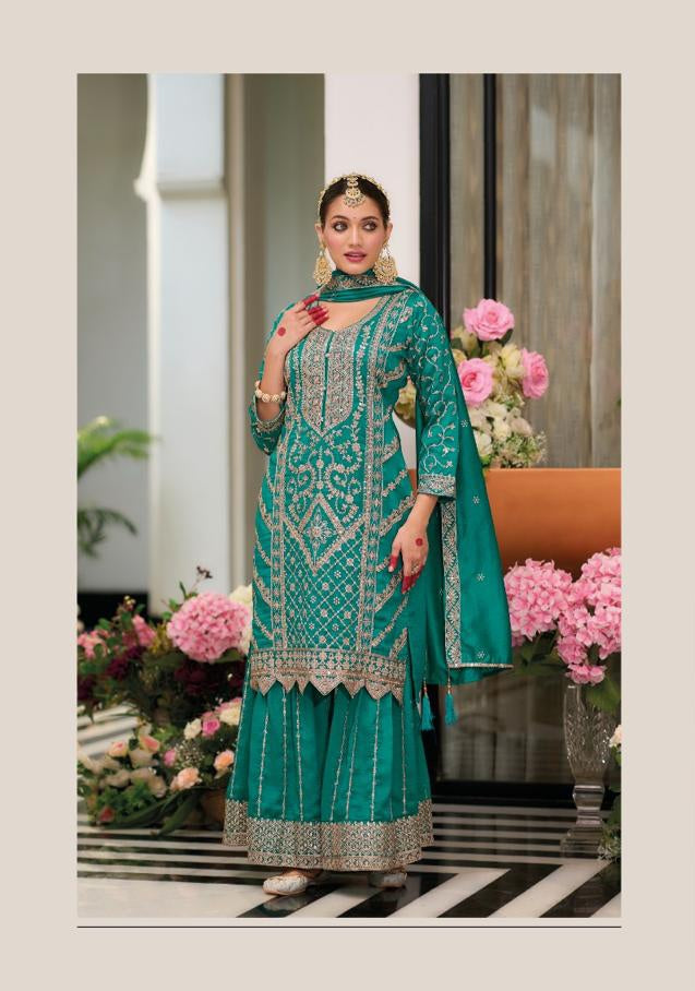 Stunning Teal Salwar Suit with embroidery work.