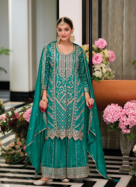 Stunning Teal Salwar Suit with embroidery work.