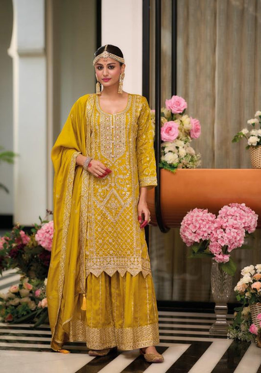 Bright mustard yellow Salwar Suit with embroidery work.