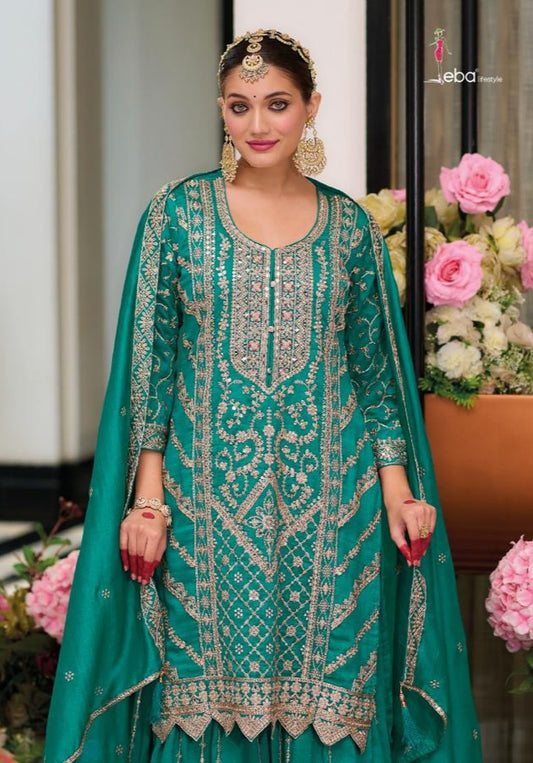 Stunning Teal Salwar Suit with embroidery work.