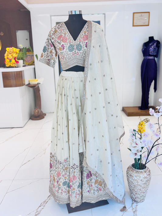 A dreamy lehenga adorned with delicate floral embroidery.